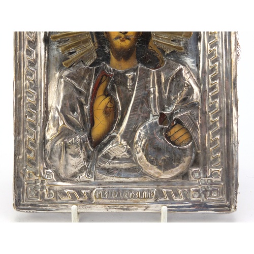 62 - Hand painted Russian orthodox icon with silver plated mounts, 18.5cm x 15cm