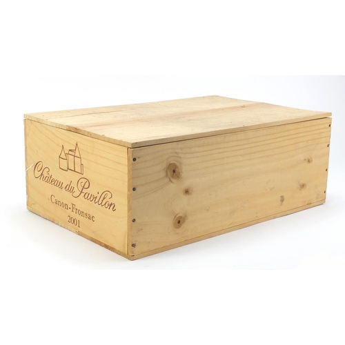 2073 - Twelve bottles of 2001 Chateau du Pavillon Canon-Fronsac red wine housed in a sealed crate