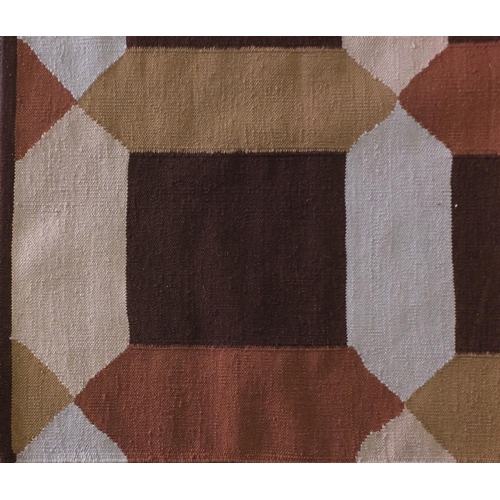 2040 - Rectangular Kilim rug, having an all over geometric design, 298cm x 203cm