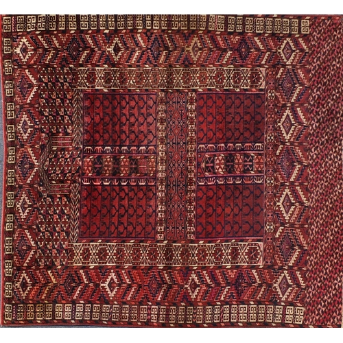 2076 - Turkman rug with all over blue and red geometric design, 140cm x 130cm