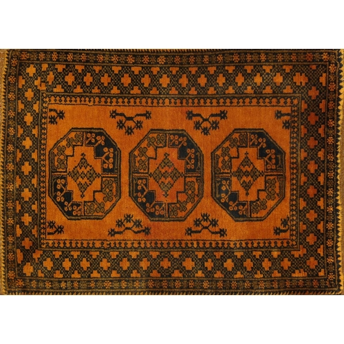 2083 - Rectangular Afghan rug having an all over geometric design, 150cm x 98cm