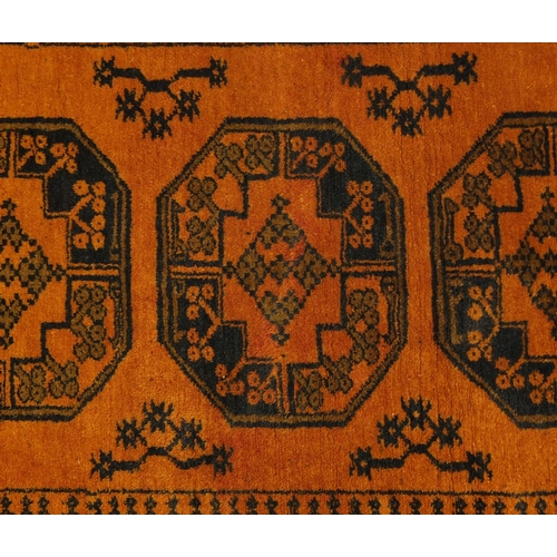 2083 - Rectangular Afghan rug having an all over geometric design, 150cm x 98cm