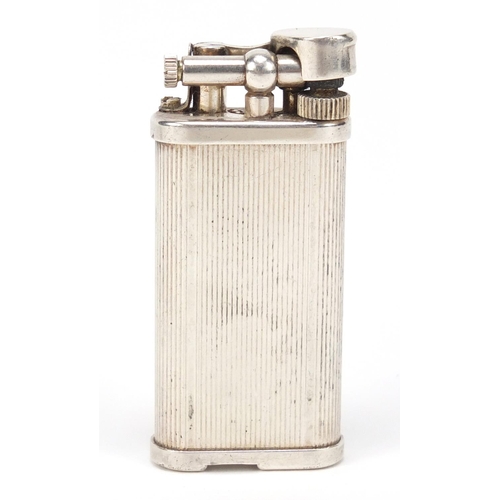 2478 - Alfred Dunhill silver plated pocket lighter with booklet, 6.5cm high