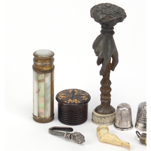 2487 - Objects including silver thimbles, Tunbridge Ware container, hand design seal and a carved leg pipe ... 