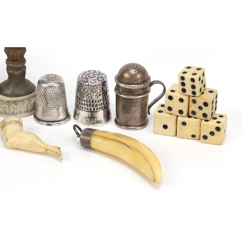 2487 - Objects including silver thimbles, Tunbridge Ware container, hand design seal and a carved leg pipe ... 