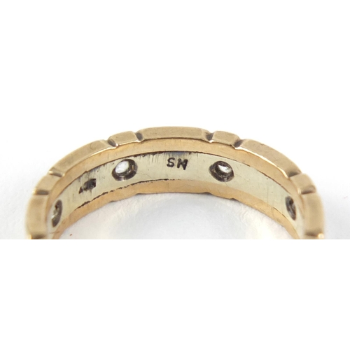 2562 - 9ct gold clear stone eternity ring, size L, 3.4g and a gold coloured metal cross pendant, 1.8g