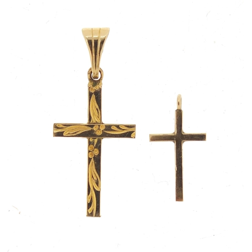 2626 - 9ct gold cross pendant and a gold plated example, the largest 2.5cm high, 1.2g