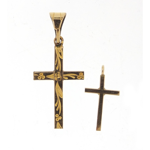 2626 - 9ct gold cross pendant and a gold plated example, the largest 2.5cm high, 1.2g