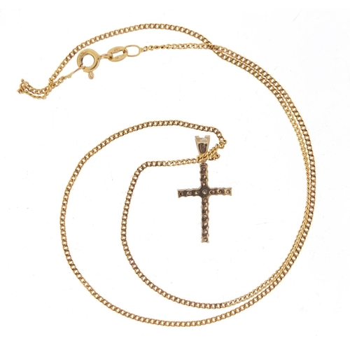 2563 - 9ct gold diamond cross pendant on a 9ct gold necklace, the pendant 2.2cm in length, 2.6g