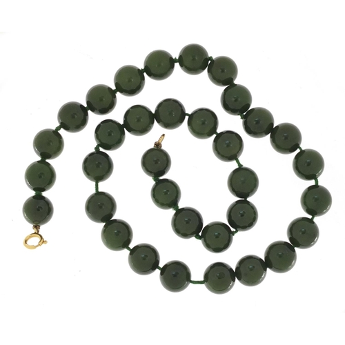 2612A - Chinese green jade bead necklace with 18ct gold clasp, 46cm in length