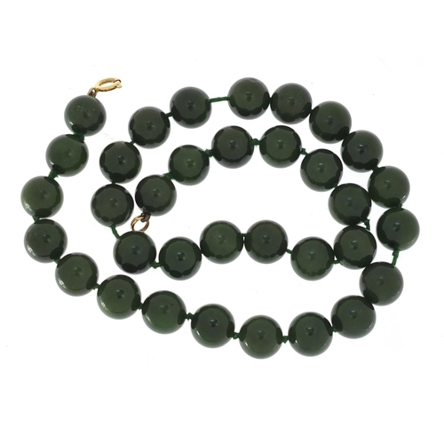 2612A - Chinese green jade bead necklace with 18ct gold clasp, 46cm in length