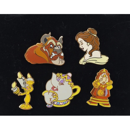 2500A - Set of enamelled Snow White & the Seven Dwarfs and Beauty and the beast badges