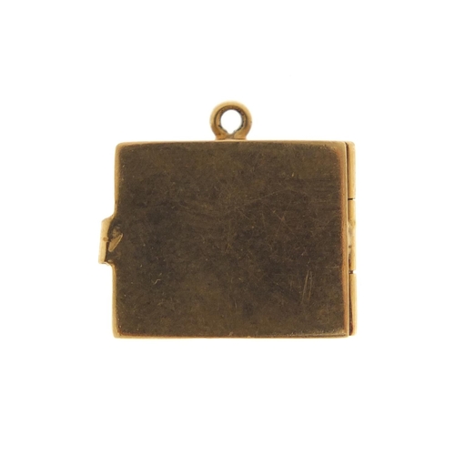 2612 - 9ct gold emergency one pound note charm, 1.5cm in length, 3.3g