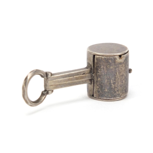 2611 - Novelty unmarked silver magnifying glass in the form of a mallet, 3.5cm in length, 10.6g