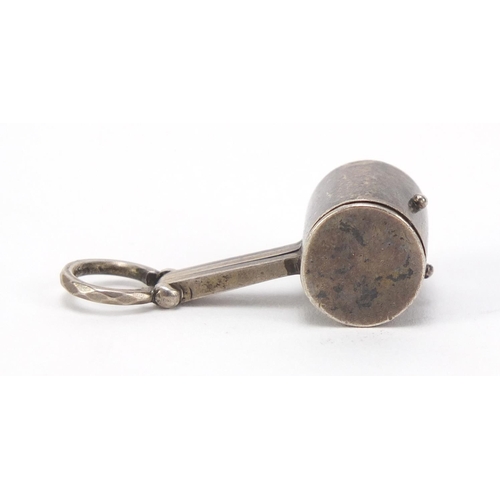 2611 - Novelty unmarked silver magnifying glass in the form of a mallet, 3.5cm in length, 10.6g