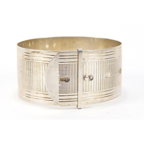 2610 - Silver buckle design bracelet, Chester 1943, 43.0g