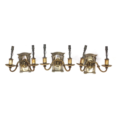 594 - Three silver plated portico design wall sconces, each 23cm high