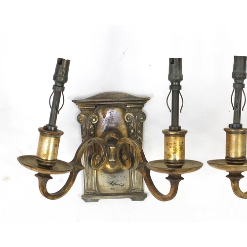 594 - Three silver plated portico design wall sconces, each 23cm high