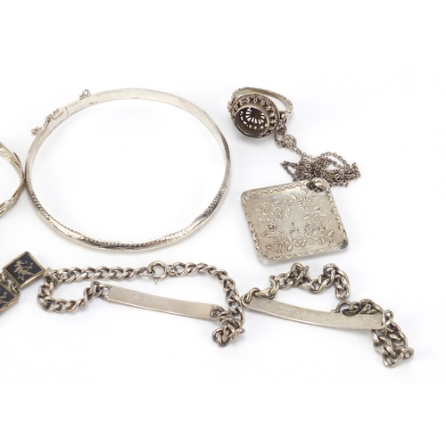 2615 - Silver and white metal jewellery including a Siam bracelet, necklaces and identity bracelets, 60.0g