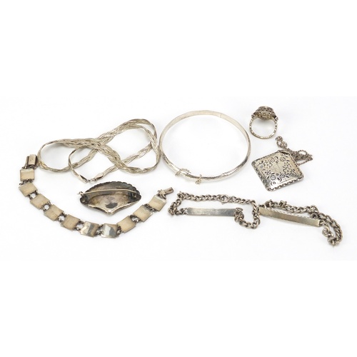 2615 - Silver and white metal jewellery including a Siam bracelet, necklaces and identity bracelets, 60.0g