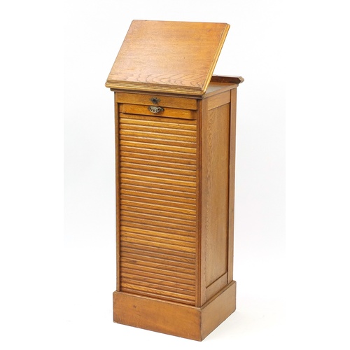 2037 - 1920's oak filing cabinet with tambour front with easel top, 116cm H x 49cm W x 42cm D