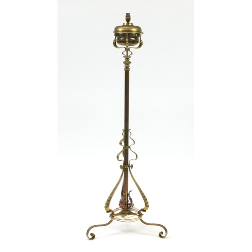 2068 - Victorian Messengers brass adjustable floor standing oil lamp, converted to electric use, 139cm high