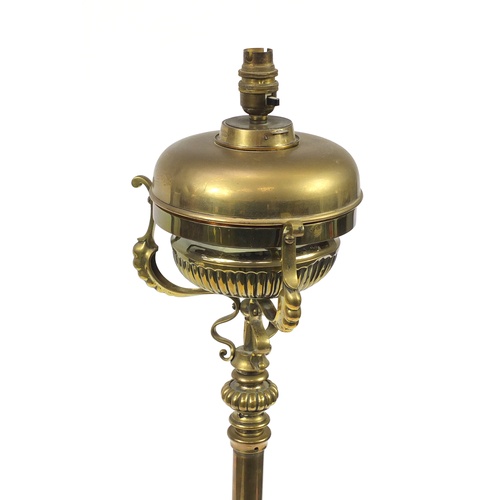 2068 - Victorian Messengers brass adjustable floor standing oil lamp, converted to electric use, 139cm high