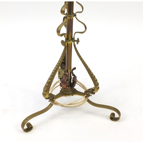 2068 - Victorian Messengers brass adjustable floor standing oil lamp, converted to electric use, 139cm high