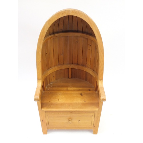 2003 - Pine porter chairs in the form of boat hull with draw to the base, 147cm high