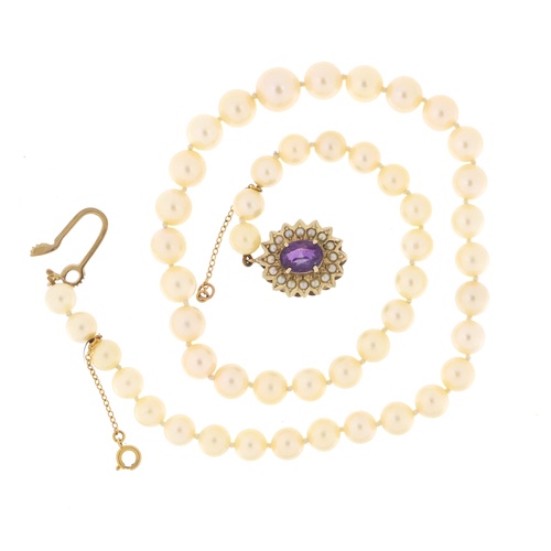 2519 - Single string pearl necklace with 9ct gold amethyst clasp, 36cm in length, 29.7g