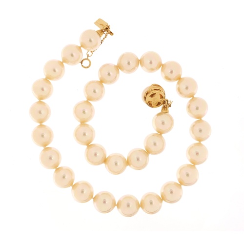 2625 - Majorica simulated pearl necklace with silver gilt clasp, with box and certificate, 40cm in length