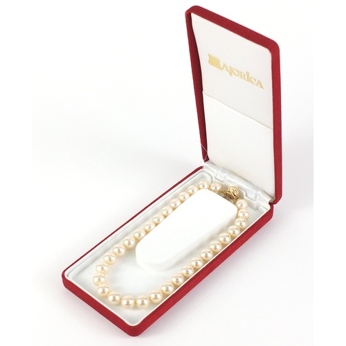 2625 - Majorica simulated pearl necklace with silver gilt clasp, with box and certificate, 40cm in length