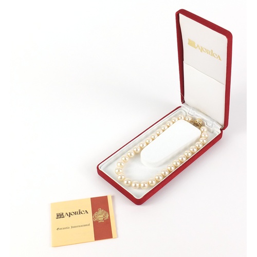 2625 - Majorica simulated pearl necklace with silver gilt clasp, with box and certificate, 40cm in length