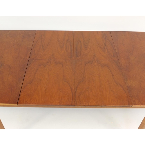 15 - 1960's teak extending dining table by Mckintosh & Co of Kirkaldy, with two fold out leaves and six b... 