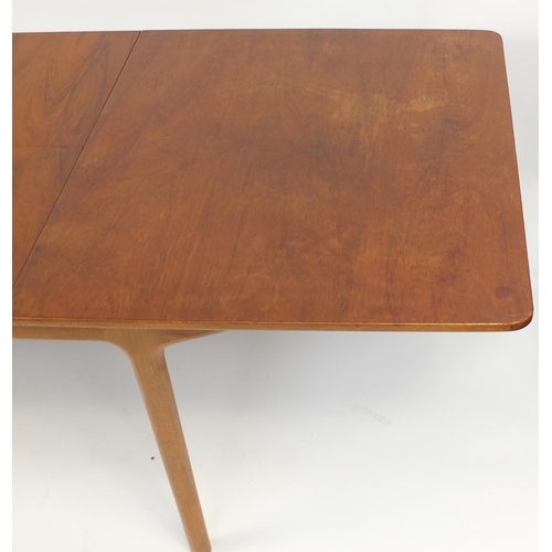 15 - 1960's teak extending dining table by Mckintosh & Co of Kirkaldy, with two fold out leaves and six b... 