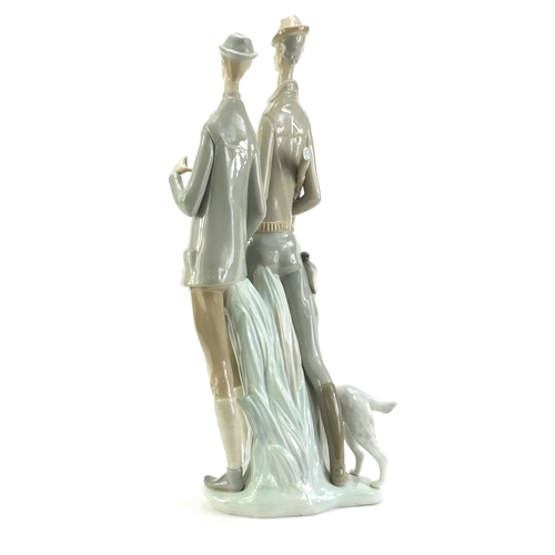 2169 - Large Lladro figure of hunters with a dog, 47.5cm high