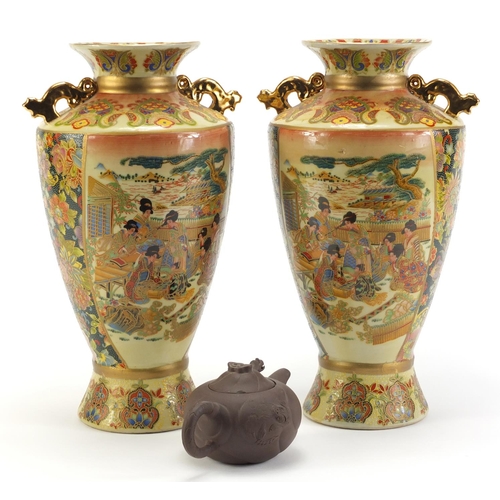 2295 - Pair of Chinese porcelain vases and a Yixing terracotta teapot, the largest each 31cm high