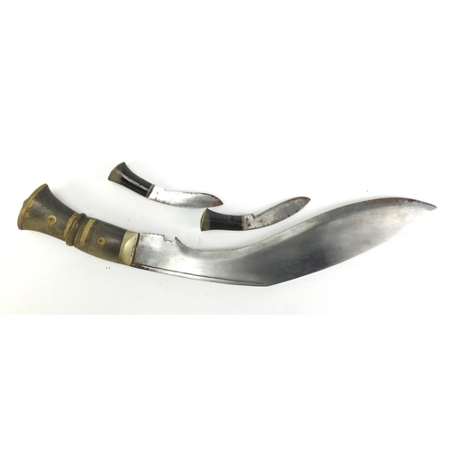 2948 - Kukri knife with leather sheath and horn handles, 44cm in length