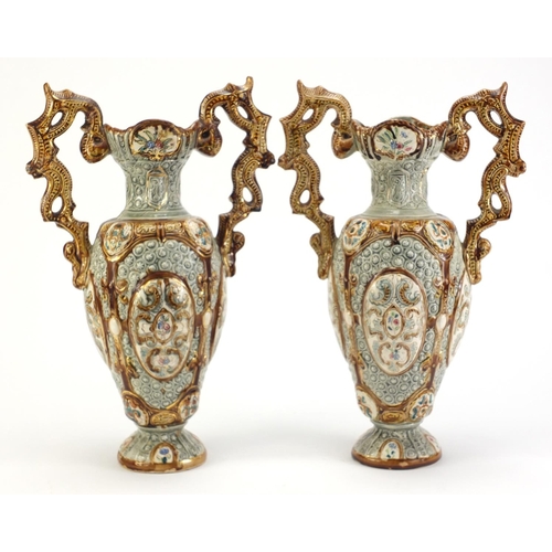 2561 - Pair of Alhambrian pottery twin handled vases, 38.5cm high