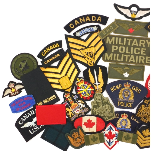 2868 - Mostly Canadian military interest cloth patches, including Police
