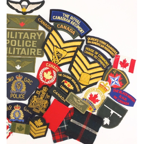 2868 - Mostly Canadian military interest cloth patches, including Police