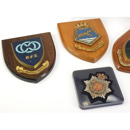 2953 - Military interest shield plaques including RFA Gold Rover, Royal Corps of Transport and the Royal Lo... 