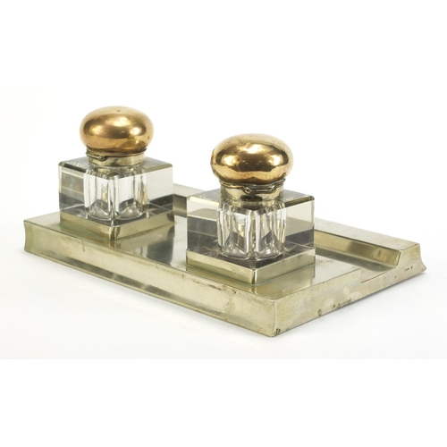 2883 - Silver plated desk stand with two square cut glass inkwells, 26cm wide