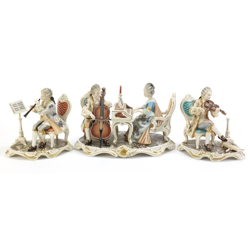 2193 - Three hand painted Dresden Kunst musician figure groups, the largest 26cm wide