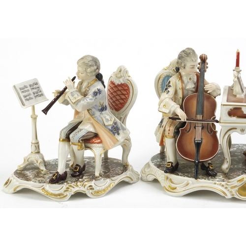 2193 - Three hand painted Dresden Kunst musician figure groups, the largest 26cm wide