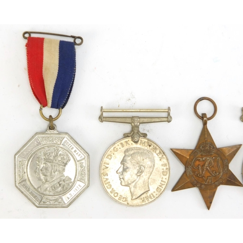 2882 - Three British military World War II medals and two 1935 silver jubilee medallions