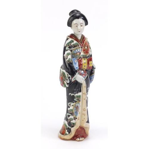 75 - Japanese porcelain figurine of a Geisha girl wearing a robe, 29cm high