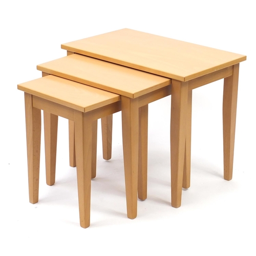 2075 - Nest of three beech occasional tables by John Coyle, the largest 50cm H x 60cm W x 37cm D