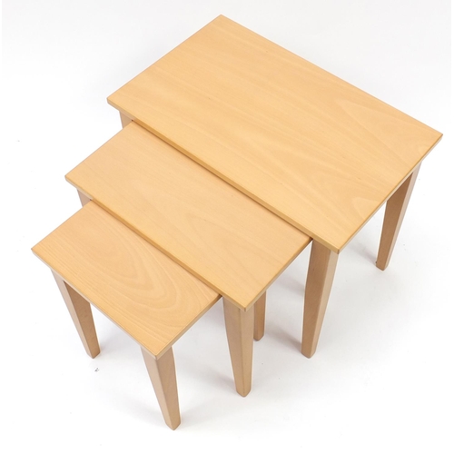 2075 - Nest of three beech occasional tables by John Coyle, the largest 50cm H x 60cm W x 37cm D