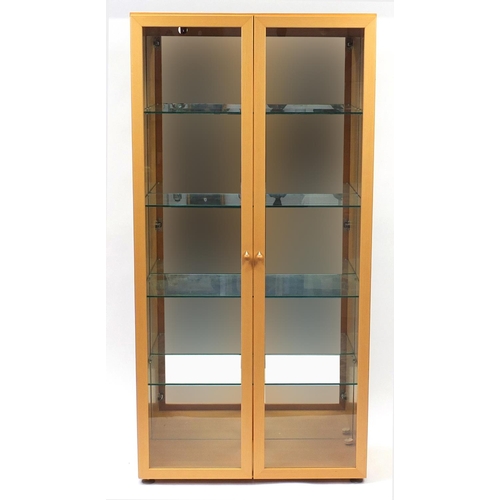 2128 - Beech illuminated display cabinet by John Coyle, with three glass shelves and mirrored back, 191cm H... 